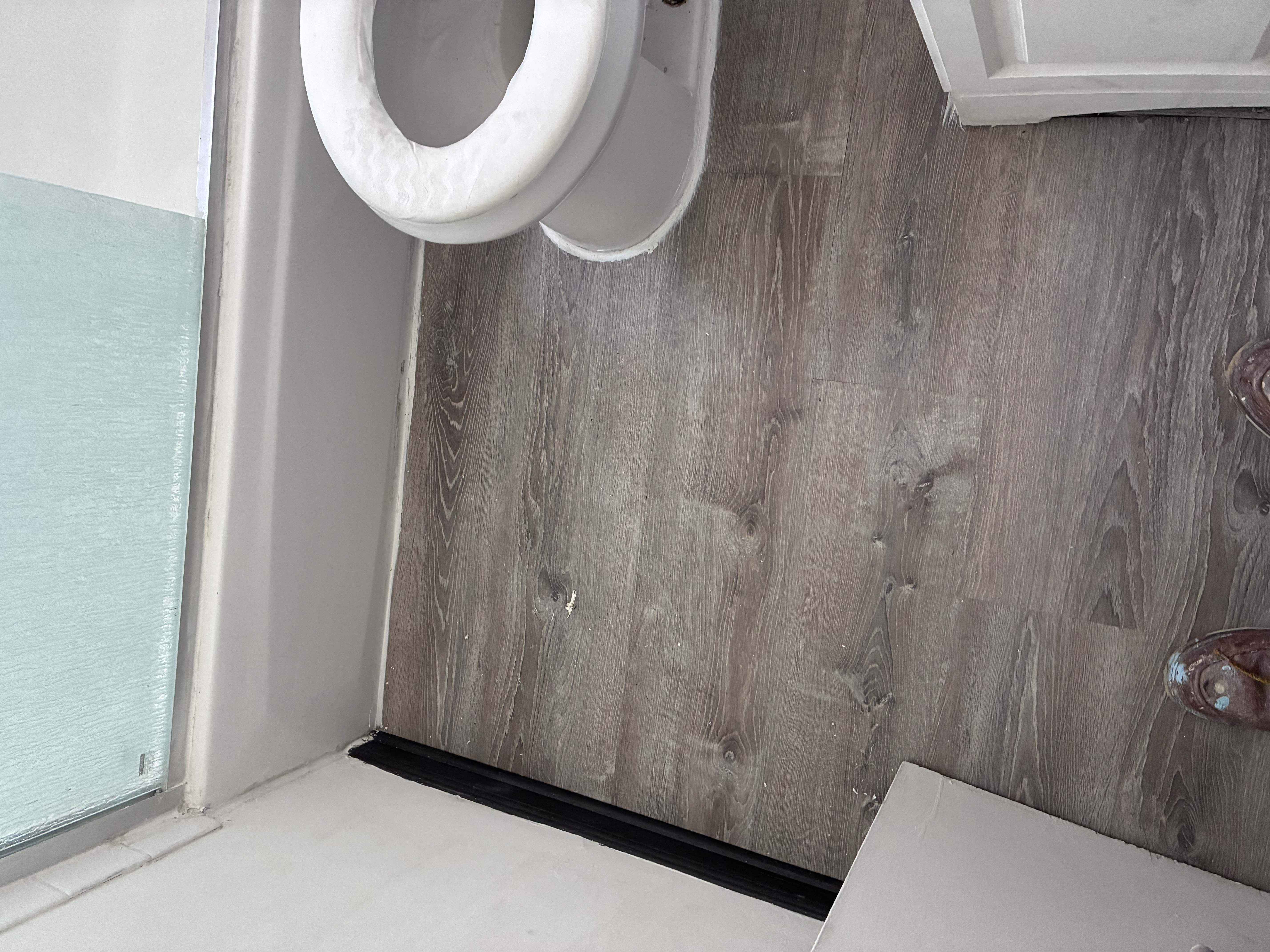 Tile-look flooring installed in a bathroom