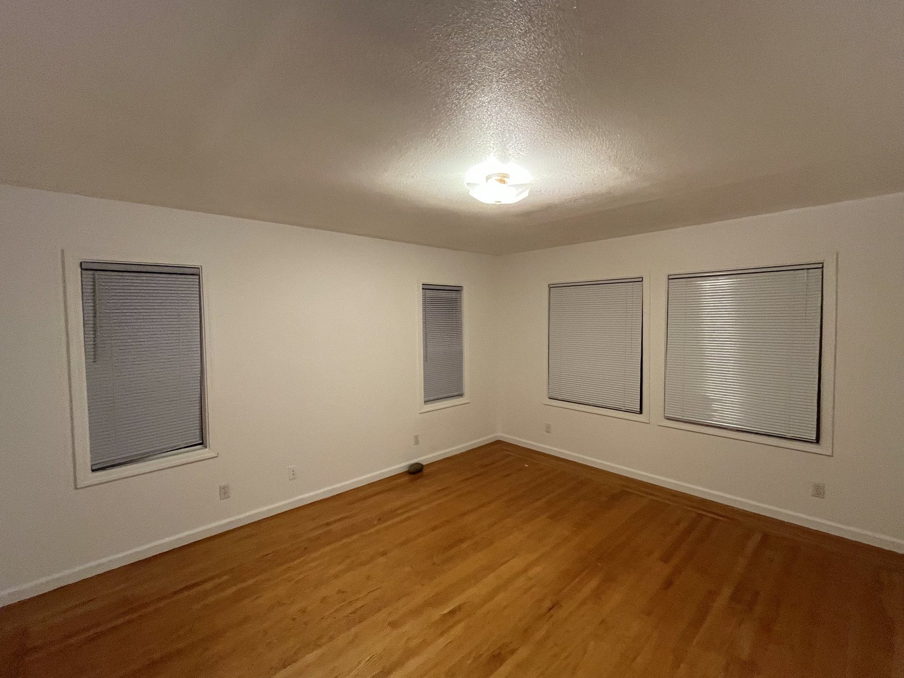 Vinyl plank flooring installed in a laundry hallway with steps