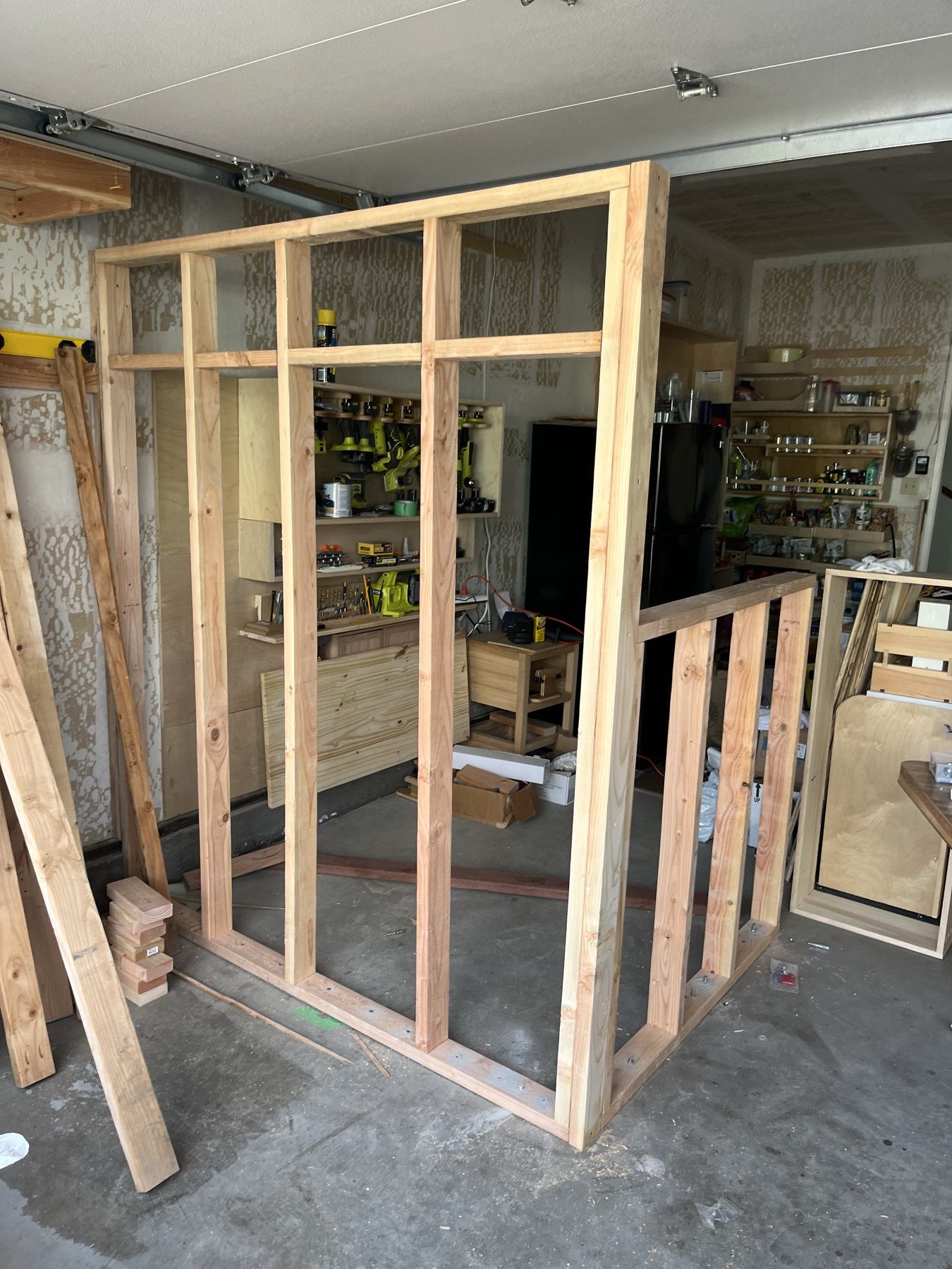 Stud wall framing with door and window openings laid out