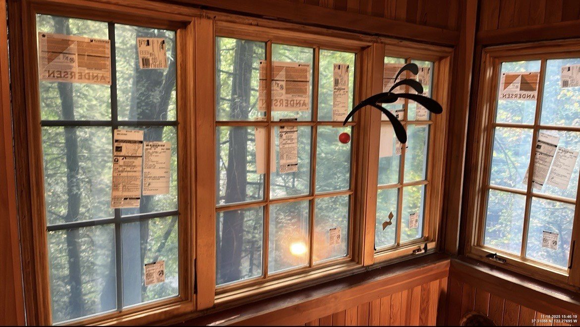 Corner Andersen windows installed in a wood cabin